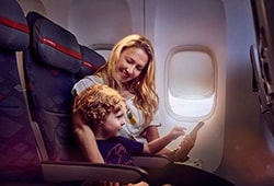 a mother with her child on a plane