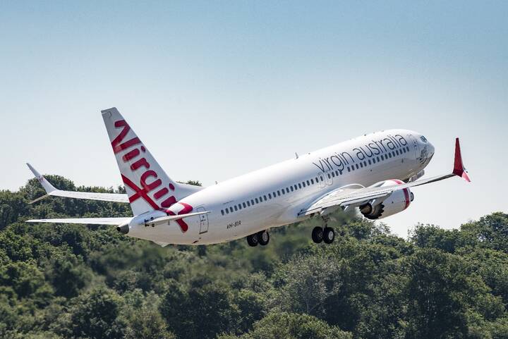 Virgin Australia aircraft on tarmac taking off for flight