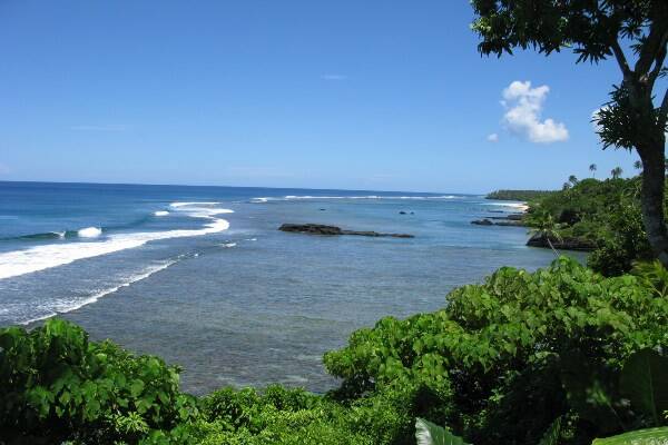 Waves crashing at beach in Samoa