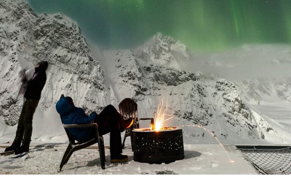 Chillaxing outside with the Northern Lights, Sheldon Chalet, credit Sheldon Chalet Alaska