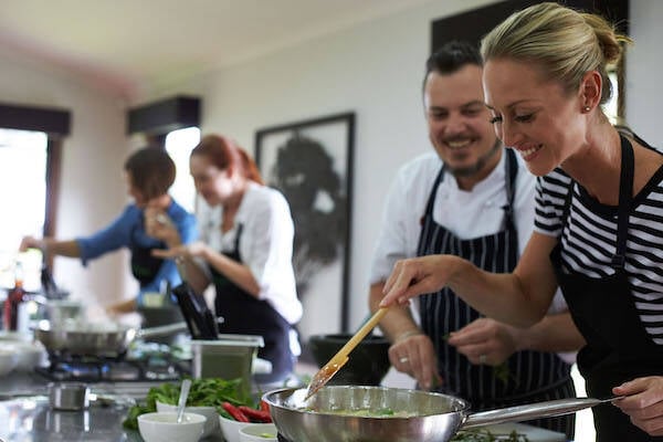 People taking cooking class at Spicers Tamarind Retreat, Sunshine Coast