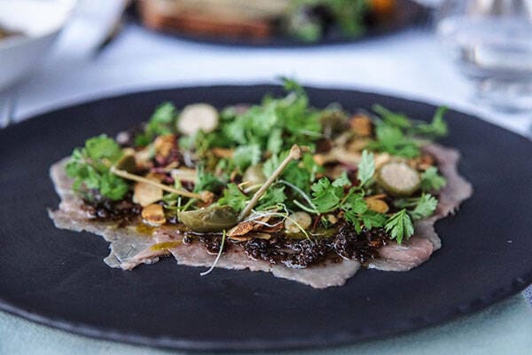 restaurant plate with carpaccio