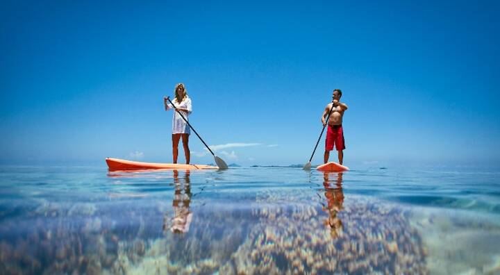 Couple paddleboarding