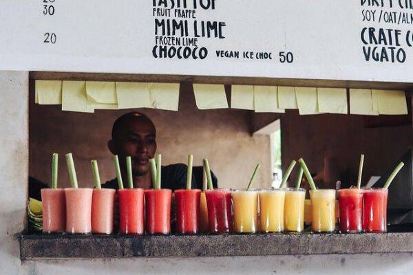 A lineup of colourful health smoothies at Crate Cafe, Canggu