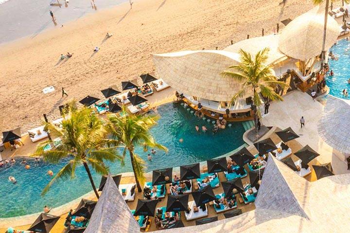 Aerial view of pool and umbrellas at Finns beach club, Bali