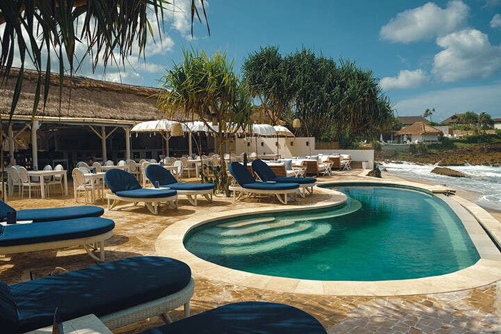 Lounges and swimming pool at Sandy Bay Beach Club, Blai