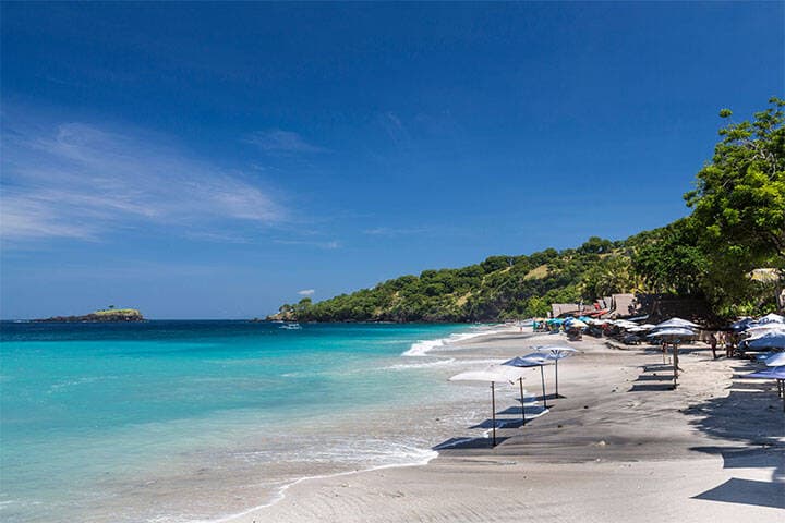 Beach bungalows on the shore of Pasir Putih, or Virgin Beach, in Karangasem province