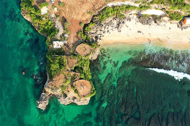 Beautiful aerial view of a cliff at Balangan Beach in Bali