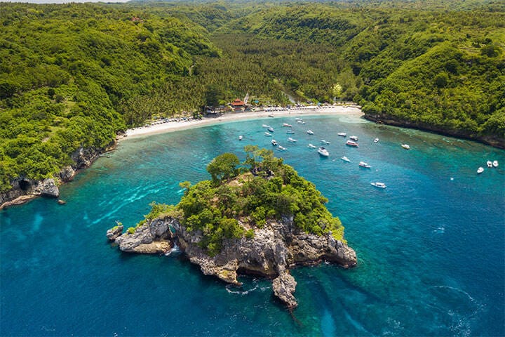 Aerial view of the Crystal Bay coastline and beach in Nusa Penida near Bali, Indonesia