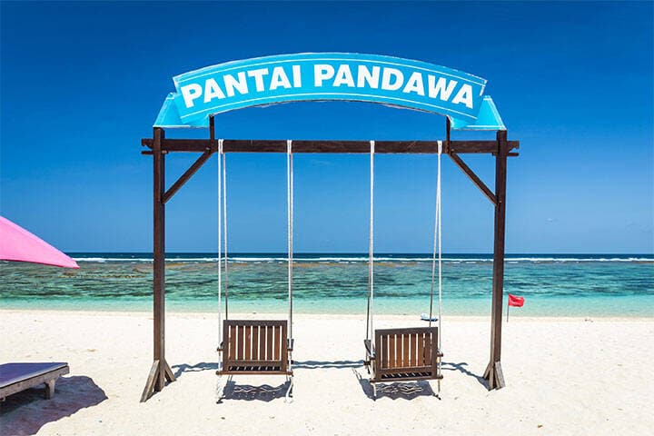 Hanging chairs with ocean views at Patnai Pandawa, Bali