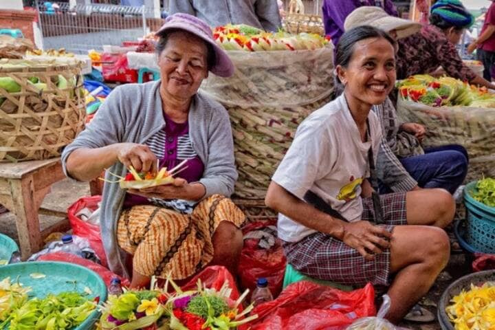 Local women in market stall at Badung Market, Bali