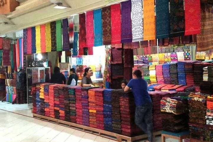 Fabric on display in stall at Pasar Endek Klungkung, Bali