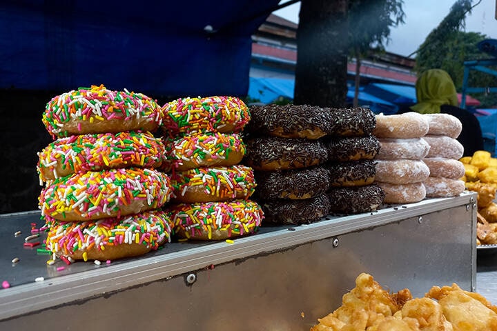 Some variants of donut are traded in the Pasar Senggol night market in Bali, Indonesia