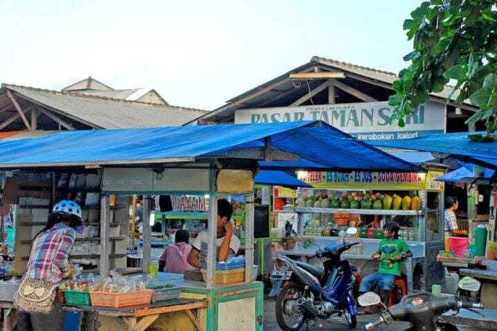 Vendor in market stall at Taman Sari Market, Bali