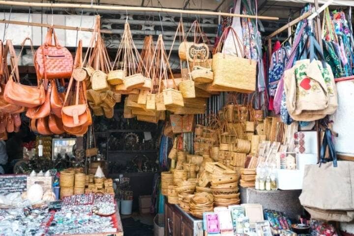 Woven bags on display at stall in Ubud Art Market, Bali