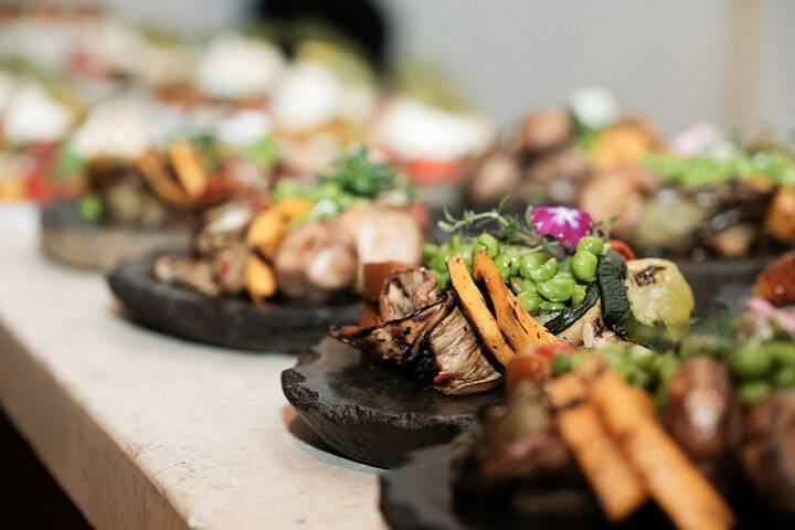 Fresh food plated on charcoal coloured plates at Sa'Mesa Canggu, Bali