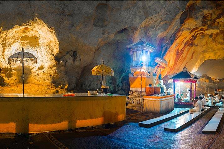 Goa Giri Putri Hindu temple on the island of Nusa Penida during ceremony, Indonesia