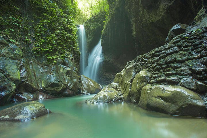 Gitgit Waterfall in Bali. Credit: Yogie from stock.adobe.com