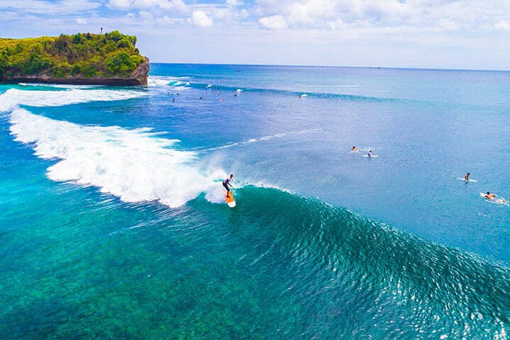 Surfers. Balangan beach. Bali, Indonesia.