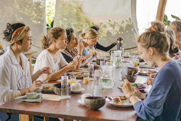 Women eating lunch in indoor dining area at Ashtari Restaurant