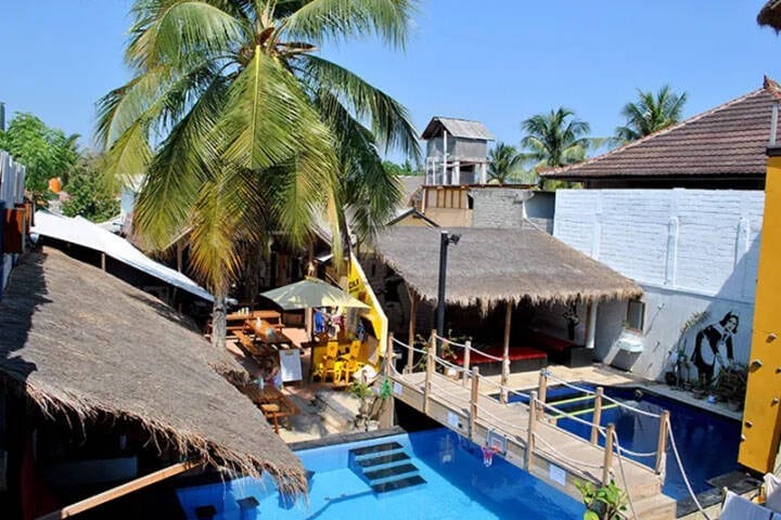 View of pool area at Gili Castle Hostel, Lombok