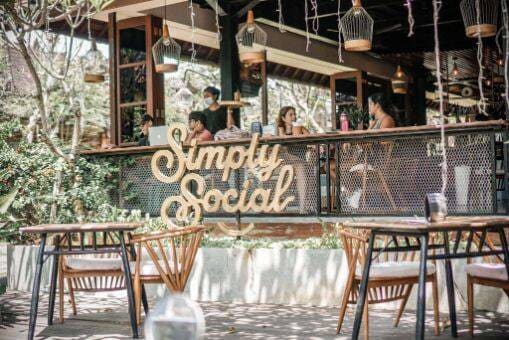 Outdoor dining and entrance of Simply Social Restaurant in Ubud, Bali