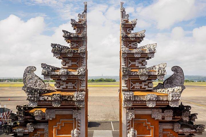 The Balinese traditional gate at Denpasar International airport, also known as Bali Ngurah Rai International Airport, Bali island, Indonesia.