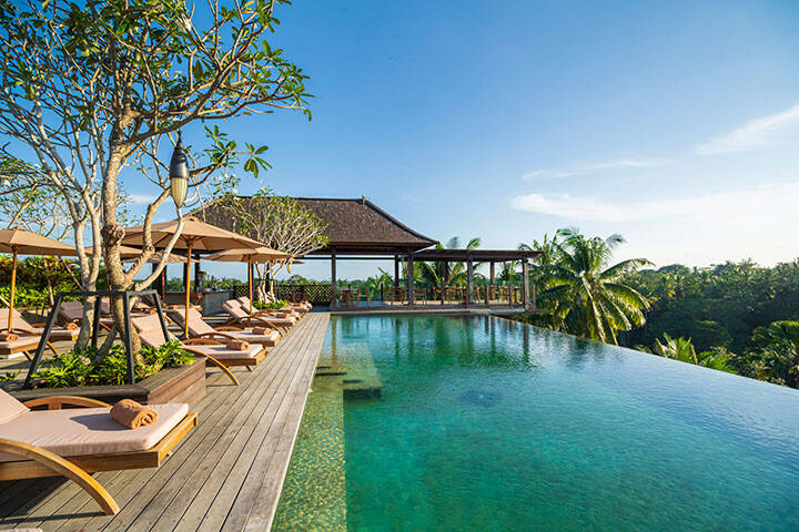 Pool area overlooking greenery at Adiwana Bisma Ubud, Bali