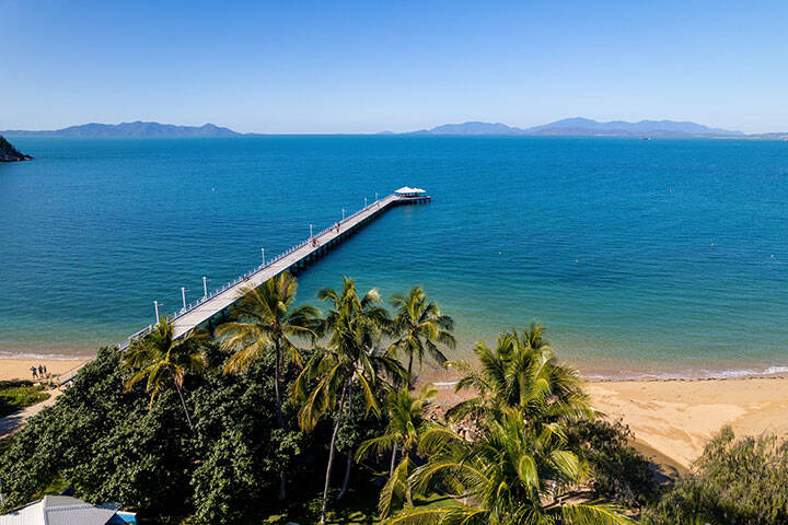 Jetty oustretching over ocean water in Townsville