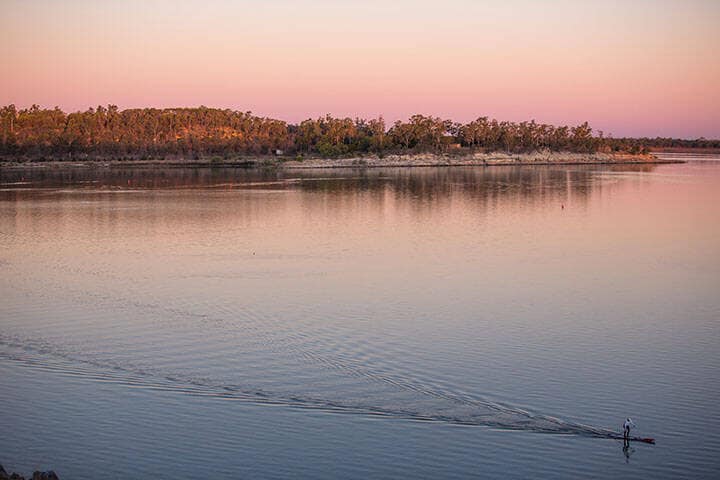 Island overlooking water on the sunset in Emerald