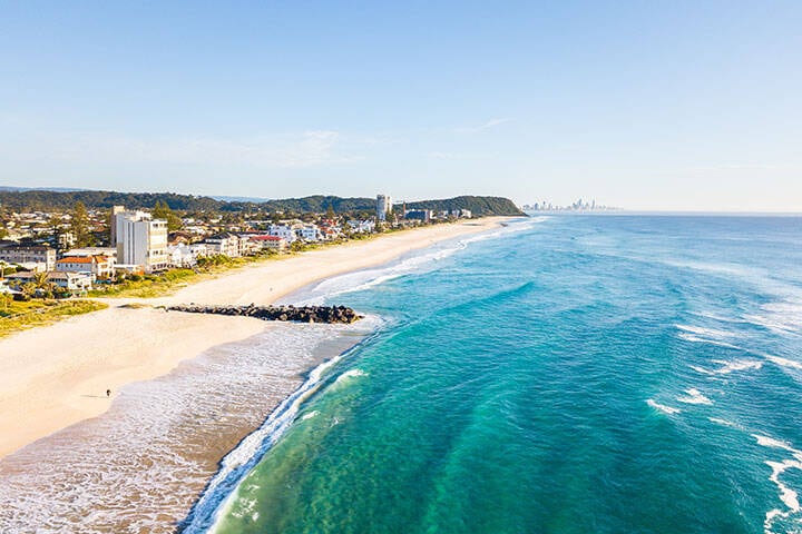 An aerial view of Palm Beach on the Gold Coast in Queensland Australia on a clear blue water day