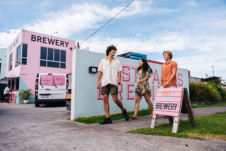 Lost Palms Brewing Co. - Group enjoying a local craft beer in a brewery