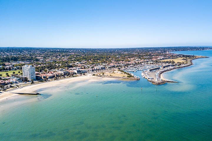St Kilda beach aerial with Melbourne City Skyline in the background