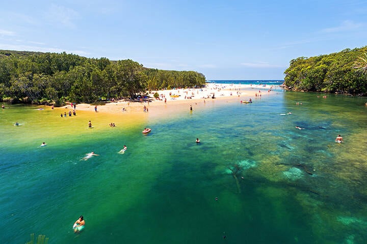 People enjoying swimming at Wattamolla, Royal National Park Sydney
