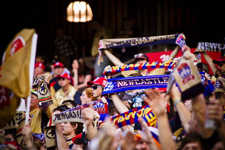 Newcastle United Jets fans enjoying a match at Hunter Stadium. 