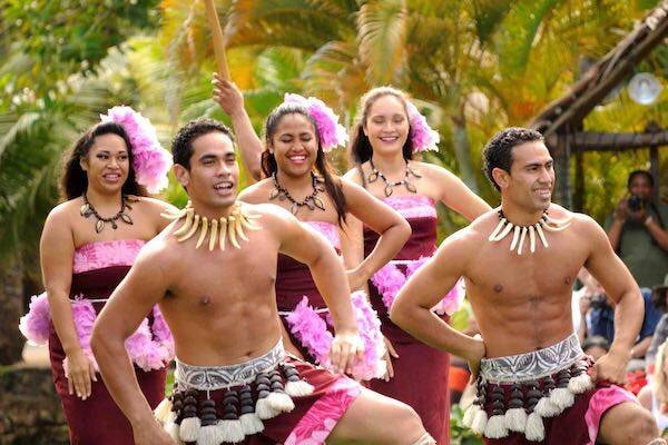 Locals performing traditional dance in native wear, Samoa