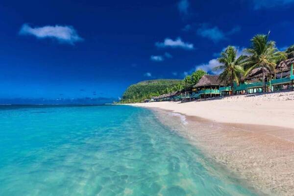Blue water over sandy beach, Samoa