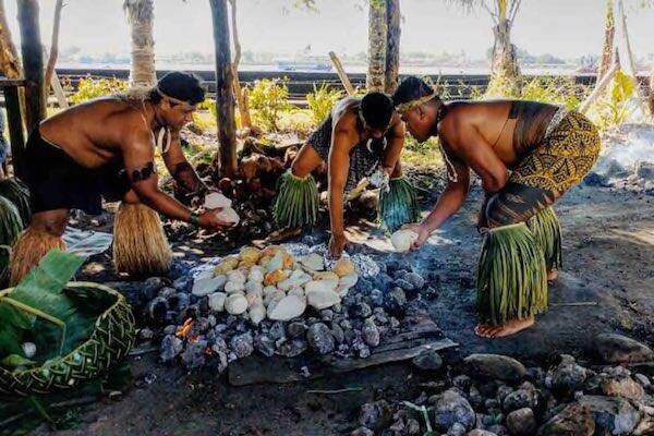 Locals cooking tradition food for cultural festival, Samoa