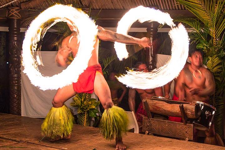 Local performing fire show for Fia Fia dance night, Samoa