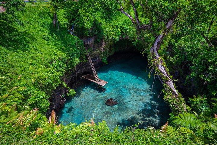 Blue lagoon in rainforest, Samoa