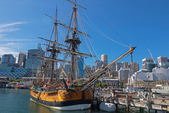 Tall Ship HMB Endeavour mooring in front of the Australian National Maritime Museum, Darling Harbour in Sydney, Australia
