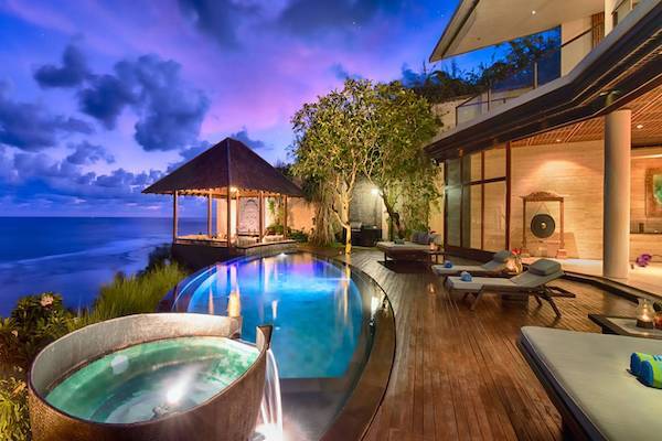 Outdoor area with private spa and swimming pool overlooking cliffs edge at Villa Bidadari Cliffside Estate, Bali