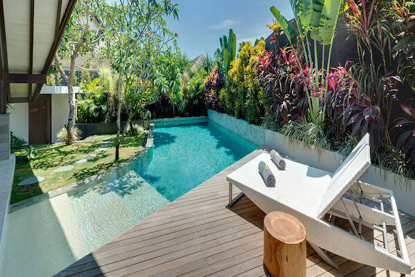 Sun lounge in private villa overlooking swimming pool at The Villa Community - The Layar Designers Villas and Spa, Bali