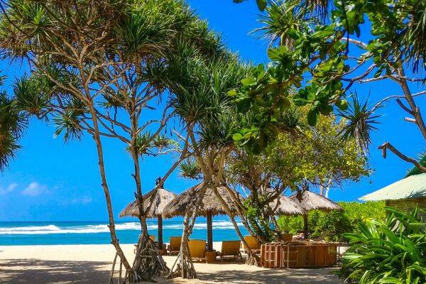 Blue skies and sunshine while enjoying peace and quiet on the beach in Nusa Dua, Bali by jarrad horne