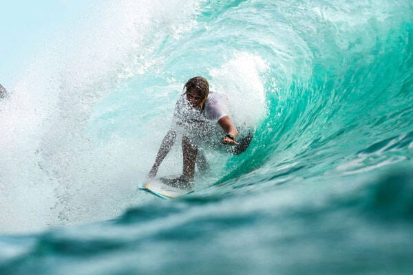 Surfing down the barrel of a wave in Bali by Jeremy Bishop