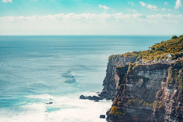 Uluwatu Temple, or Pura Luhur Uluwatu, perched on top of a steep cliff approximately 70 metres above the waves of the Indian Ocean by V