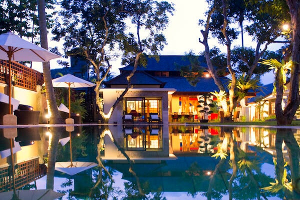 Night time lights illuminate outdoor private pool at Villa San, Bali