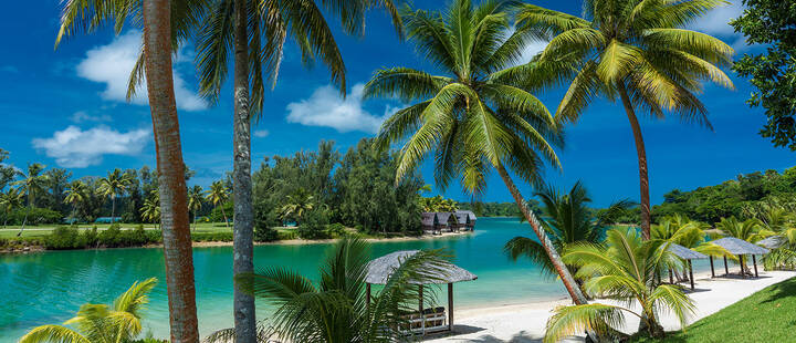 Tropical resort destination in Port Vila, Efate Island, Vanuatu, beach and palm trees