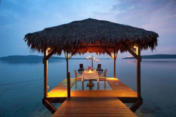 Sunset dinner over water, Vanuatu