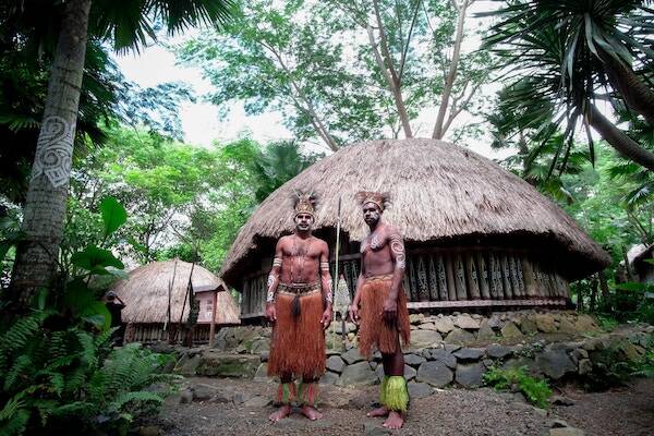 Locals dressed in traditional wear at Ekasup Village, Vanuatu 